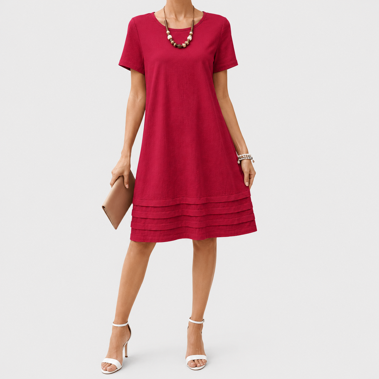 Red short sleeve shift dress with layered hem detail