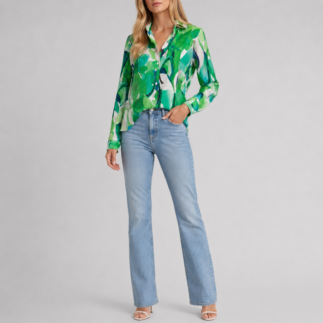 Abstract print blouse with split V-neck, button-front detail, and long sleeves in a relaxed silhouette