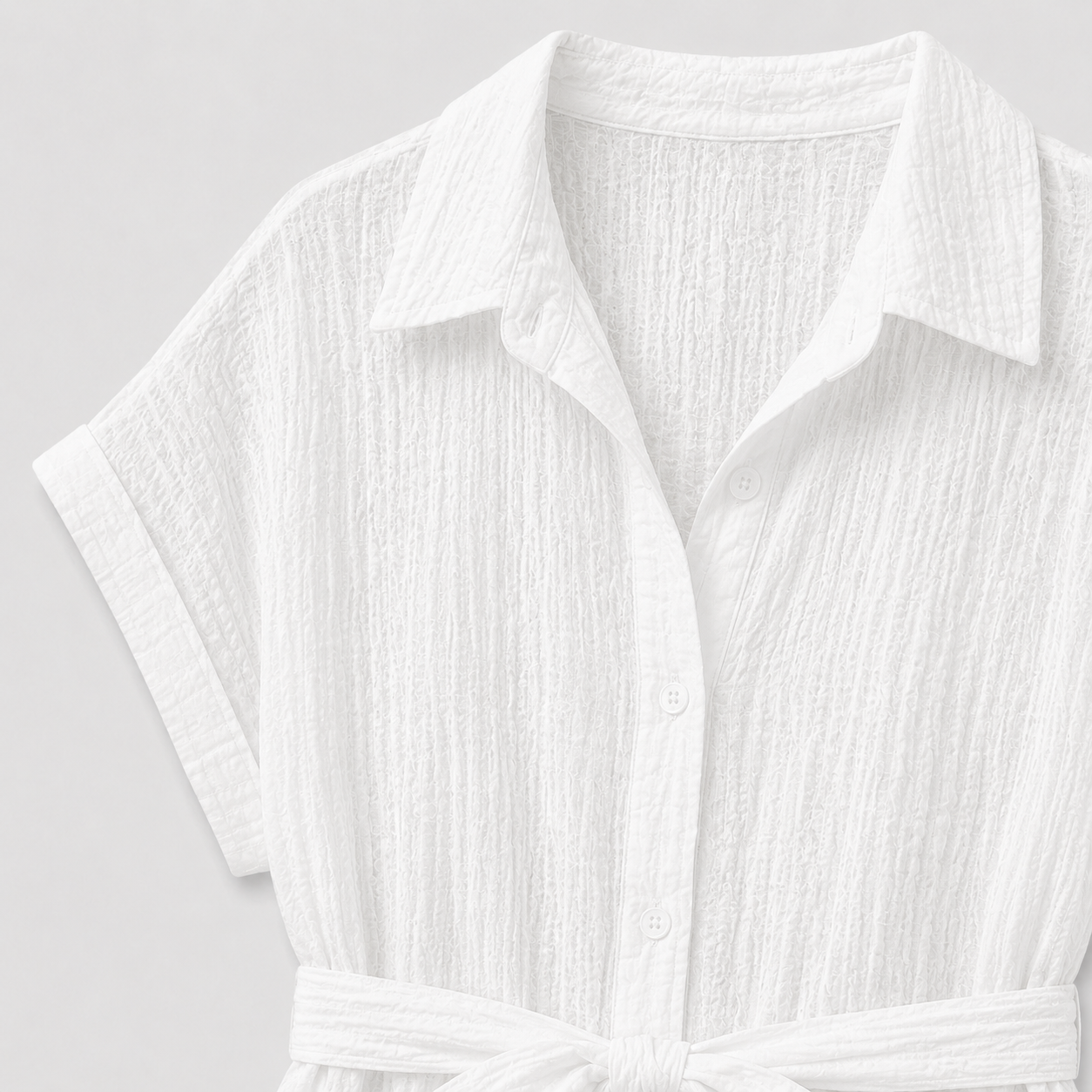 White textured shirt dress with short sleeves and tie waist